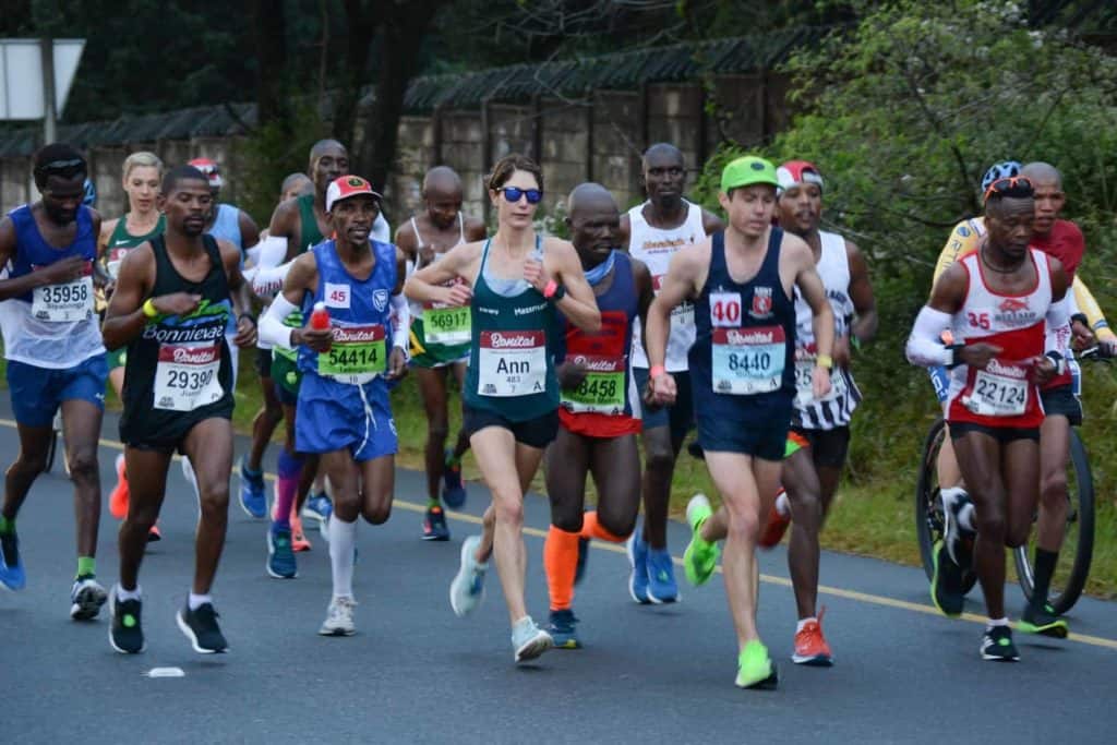Group of elite runners running the Comrades Marathon